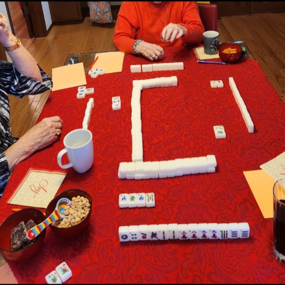 Mah Jongg Tile Set includes Tiles, Game Instruction Booklet, a pair of Dice